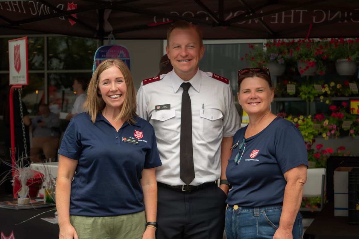 From left, Karyan Stratton, David Cain and Nellwyn Barnett stand outside the Salvation Army tent at the Fred Meyers in the Spokane Valley on August 1, 2025. (Courtesy of Londynne Stratton)