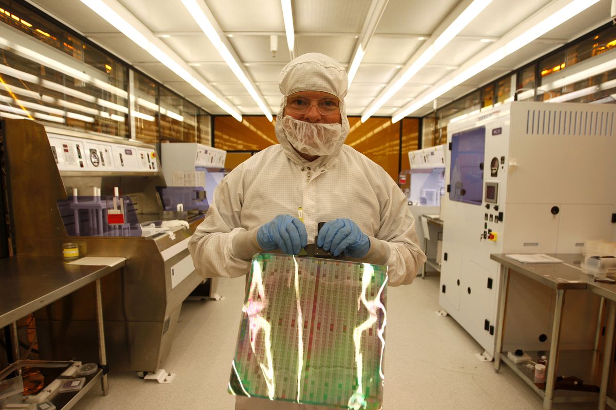 Michael Kocisis, a senior print engineer at Kovio, holds a steel sheet imprinted with silicon ink in the clean room at Kovio in Milpitas, Calif. Kovio is developing printed semiconductors.McClatchy Tribune photos (McClatchy Tribune photos / The Spokesman-Review)