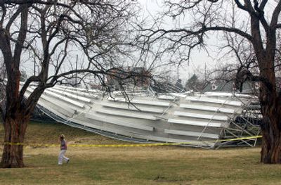 
The bleachers of the Jayhawk Soccer Complex on the University of Kansas campus in Lawrence are upended after a storm hit  Sunday. 
 (Associated Press / The Spokesman-Review)