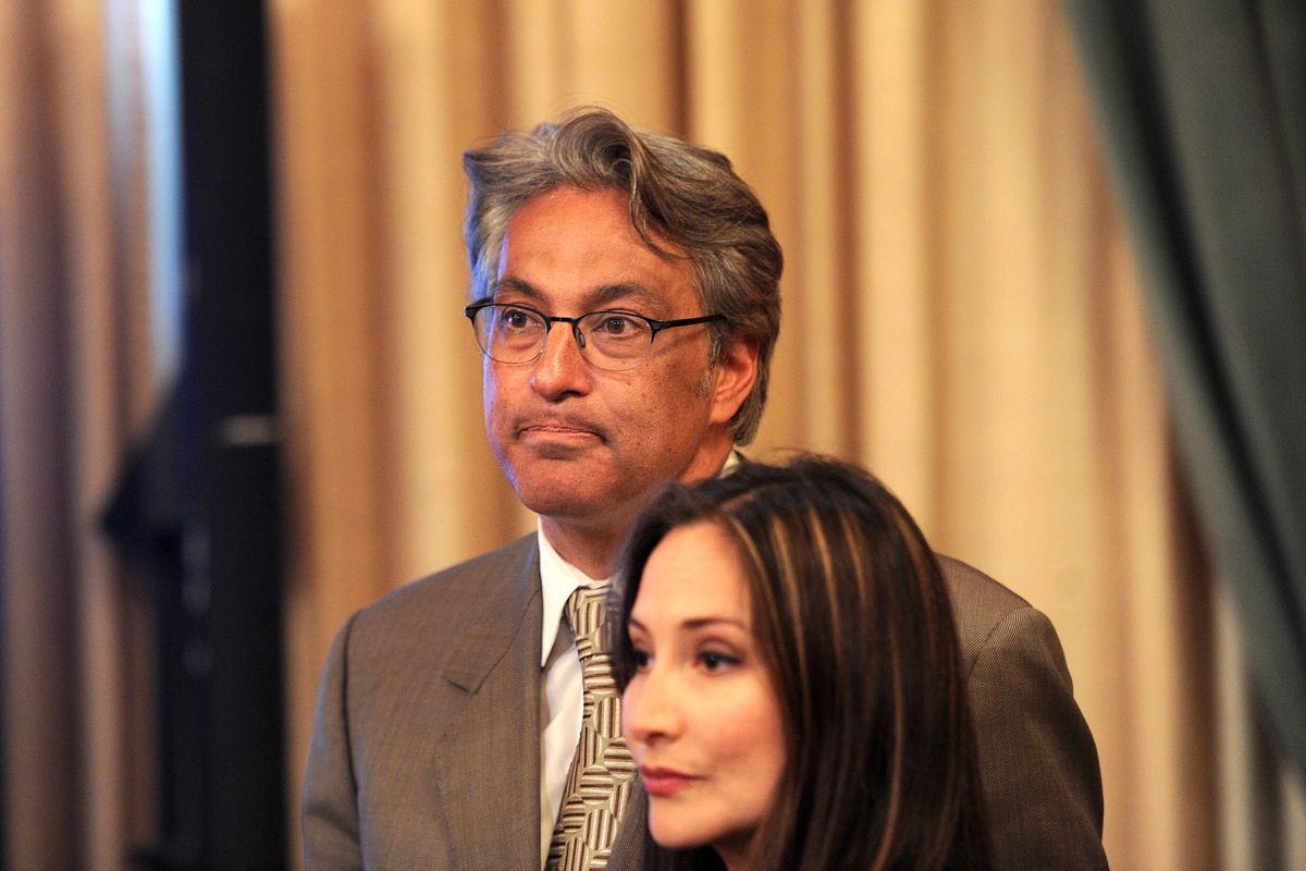 Suspended San Francisco Sheriff Ross Mirkarimi and his wife Eliana Lopez wait for the Board of Supervisors to convene on Tuesday, Oct. 9, 2012, in San Francisco. The Board planned to vote on removing Mirkarimi, who pled guilty to a misdemeanor charge in a domestic violence case, from office. (Noah Berger / Fr34727 Ap)