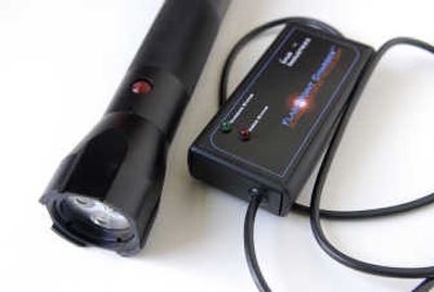 
Ivus Industries' rapidly rechargeable heavy-duty flashlight has a recommended retail prices of $229.
 (The Spokesman-Review)