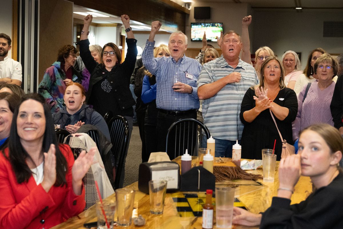 North Idaho Republicans, a moderate group campaigning for precinct committee races against the Kootenai County Republican Committee react as early election results for precinct committee races are posted on a screen, Tuesday, May 21, 2024, at the Coeur d’Alene Public Golf Club clubhouse.  (COLIN MULVANY/THE SPOKESMAN-REVI)