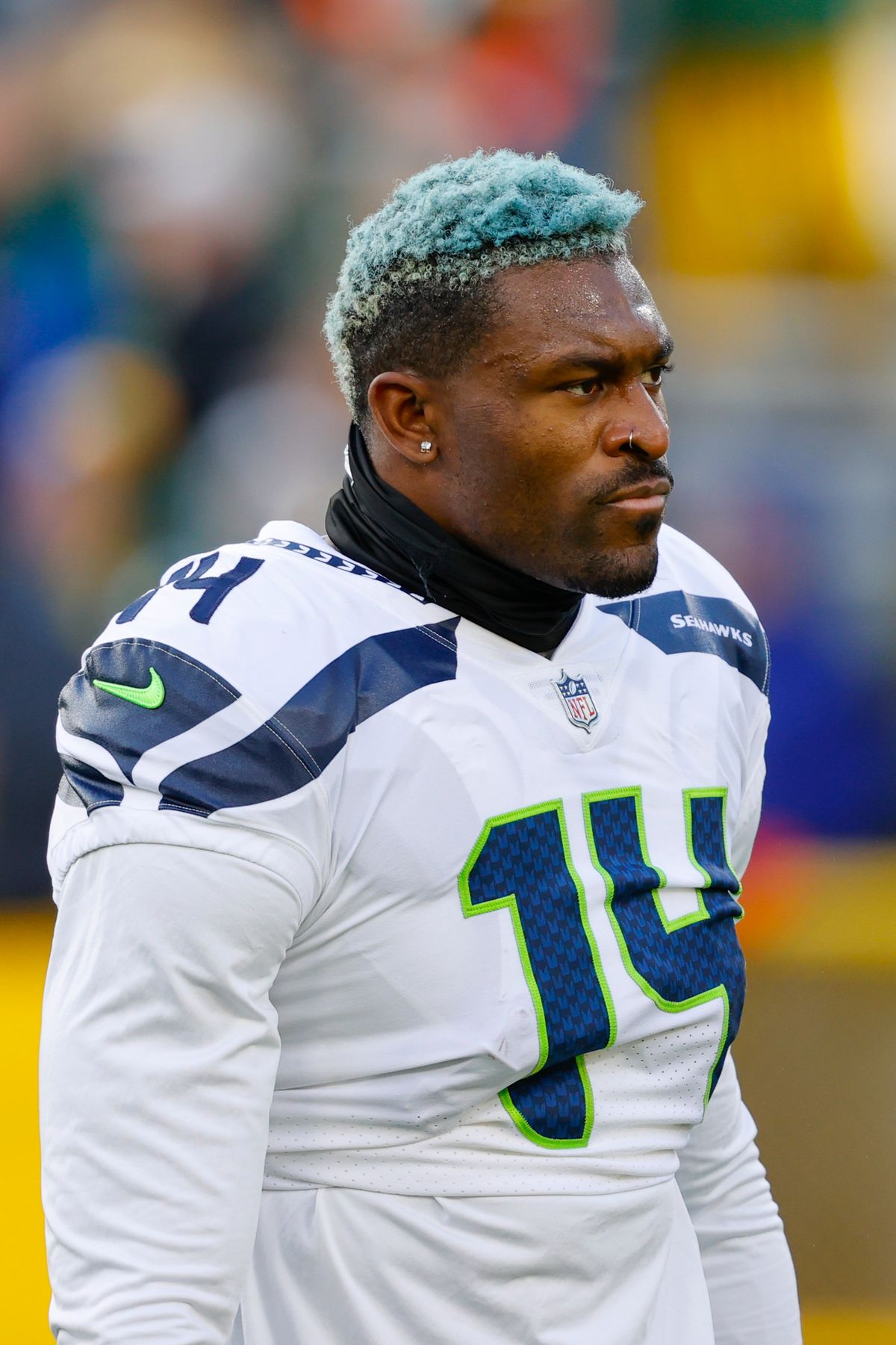 Seattle Seahawks wide receiver DK Metcalf (14) stands on the field before playing the Green Bay Packers during an NFL football game Sunday, Nov 14. 2021, in Green Bay, Wis.  (Jeffrey Phelps)