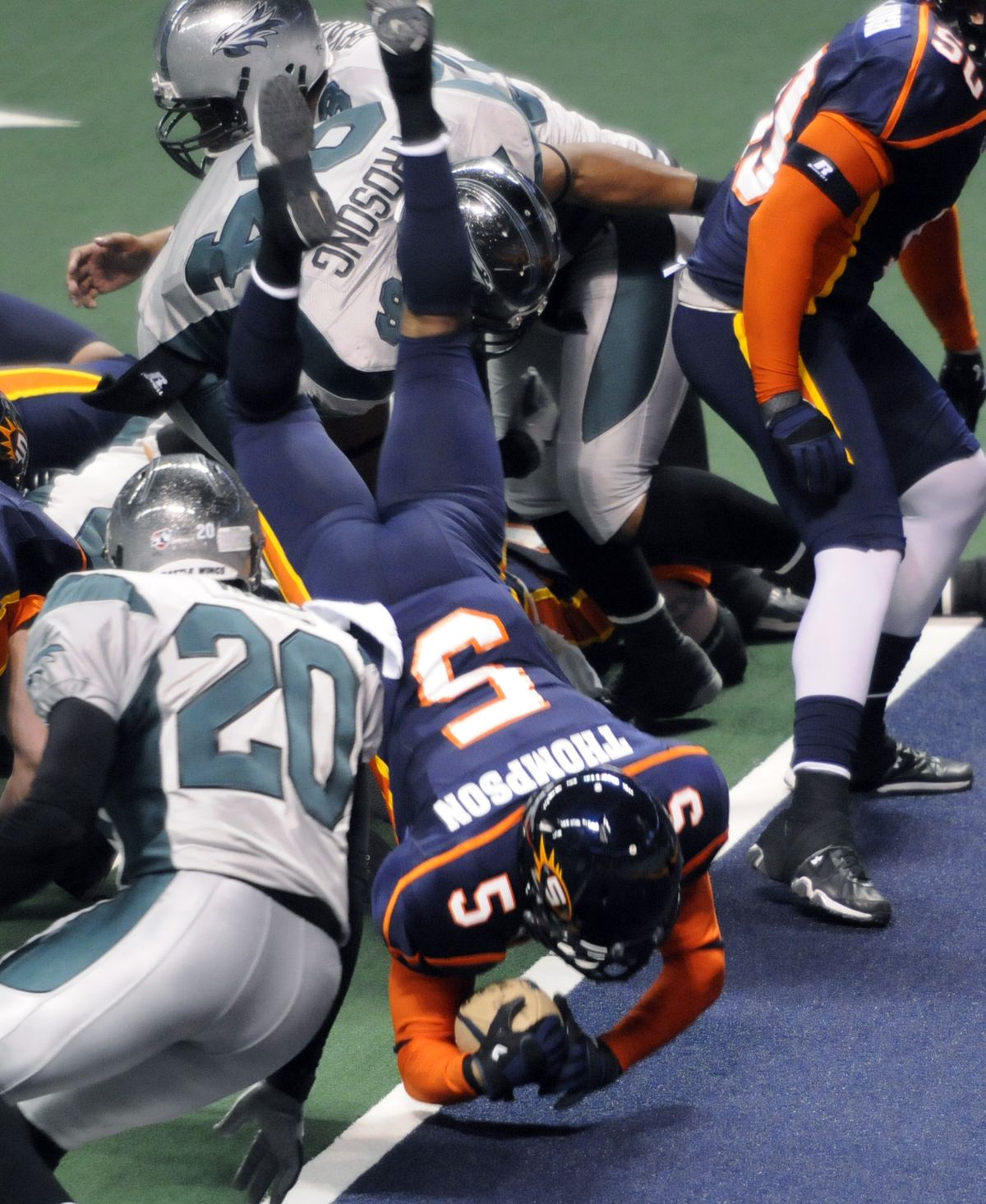 Eddie Thompson (5) of the Spokane Shock dives headfirst for a touchdown against Bossier-Shreveport in the first quarter Friday, April 17, 2010, in the Spokane Arena. (Dan Pelle / The Spokesman-Review)