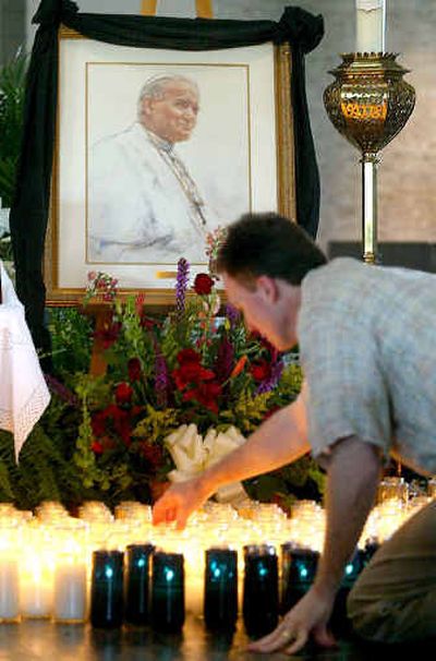 
Grant Orr, owner of the Grant T. Orr Church Goods Company, has been overwhelmed with the demand for candles since the death of Pope John Paul II on Saturday and selling out of his current stock. 
 (Associated Press / The Spokesman-Review)