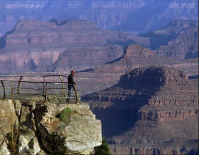 A visitor looks into the South Rim of the Grand Canyon from Yaki Point.Associated Press
 (File Associated Press / The Spokesman-Review)