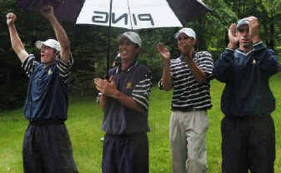 
Cal golfers celebrate after winning the NCAA Division I men's championship.
 (Associated Press / The Spokesman-Review)