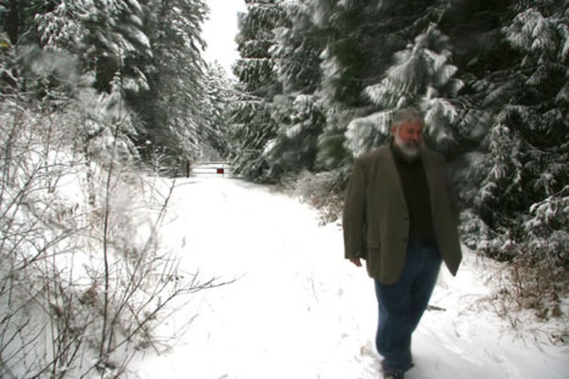 Rathdrum Mayor Vic Holmes visits the city's property on Rathdrum Mountain on Wednesday. The city is hoping to resolve access hurdles to its 557-acre site, allowing for future low-impact recreation opportunities. (Brain Walker/press)