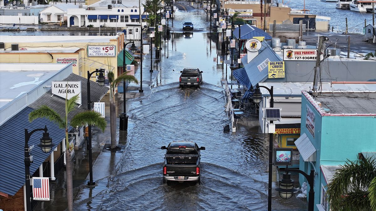 Flood waters inundate the main street after Hurricane Helene passed offshore on Sept. 27, 2024, in Tarpon Springs, Florida. Hurricane Helene made landfall Thursday night in Florida