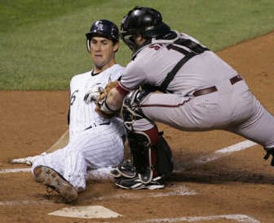 
Colorado's Jeff Francis, left, and Arizona catcher Chris Snyder won't have to introduce themselves when the teams meet in the NLCS. Associated Press
 (Associated Press / The Spokesman-Review)