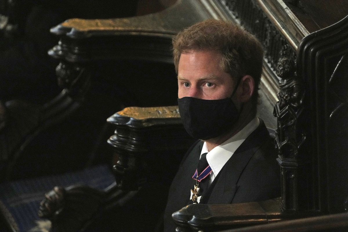 Prince Harry sits alone at St. George’s Chapel during the funeral for Prince Philip, at Windsor Castle, Windsor, England, Saturday April 17, 2021. Prince Philip died April 9 at the age of 99 after 73 years of marriage to Britain