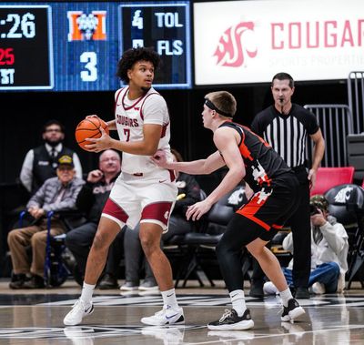 Washington State forward Eemeli Yalaho surveys the floor against Mercer during a nonconference game at Beasley Coliseum on Saturday in Pullman.  (Courtesy of WSU Athletics)