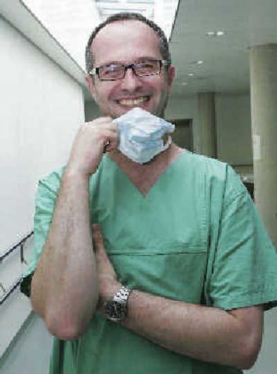 
German physician Christian Favoccia ia leaving his clinic job in Duesseldorf for a new position at a hospital in Amsterdam, Netherlands.
 (Associated Press / The Spokesman-Review)