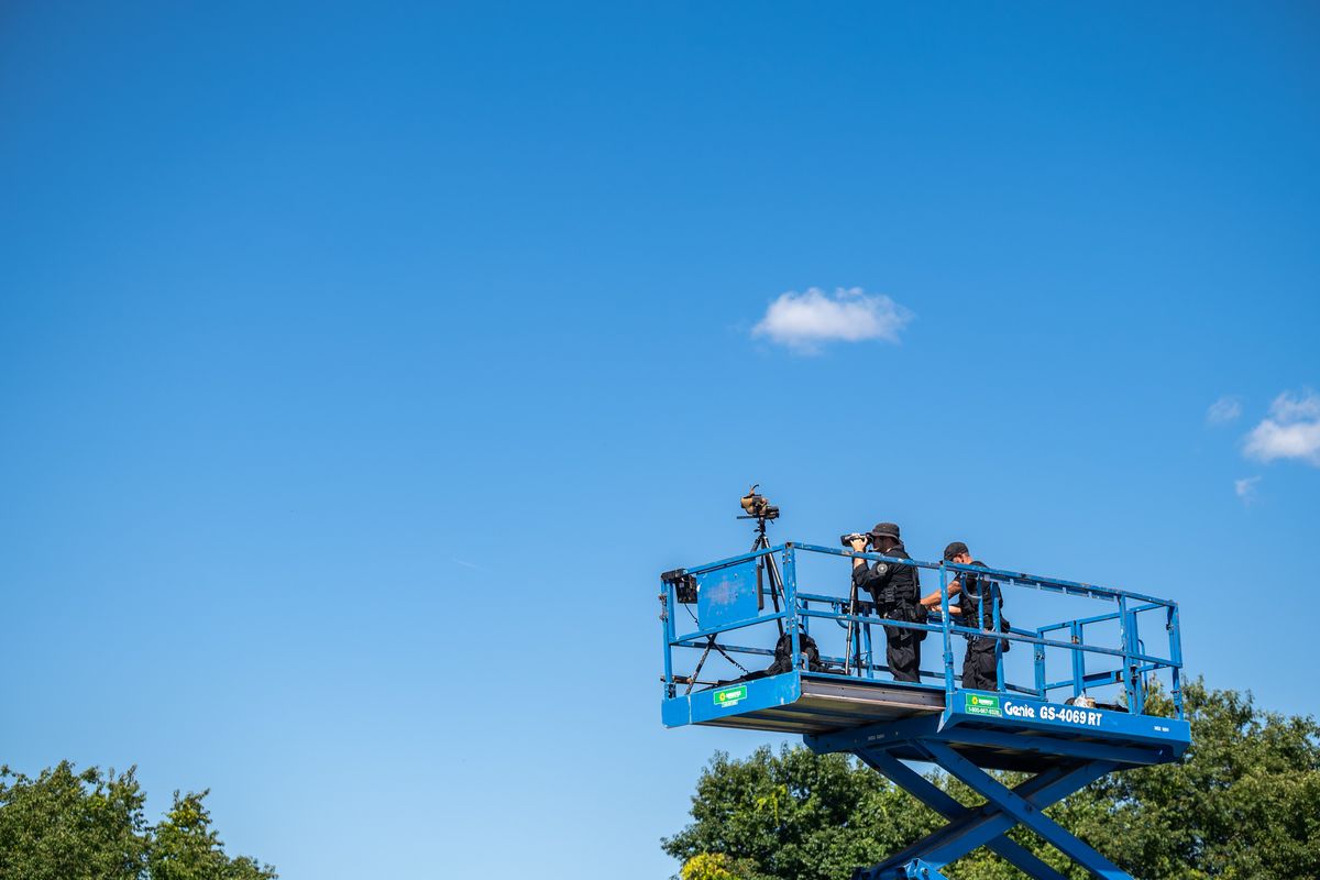 Secret Service agents keep watch during a campaign rally for Kamala Harris in North Hampton, N.H.   (Kylie Cooper/For The Washington Post)