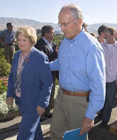 Sen. Larry Craig and his wife, Suzanne, step away from the podium  in Boise on Saturday after  he announced his resignation. Associated Press
 (Associated Press / The Spokesman-Review)