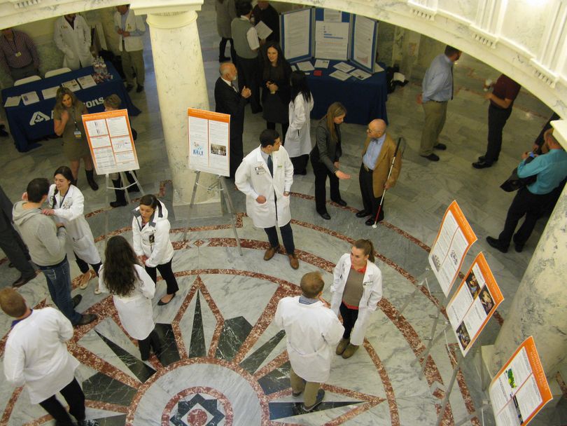 Among many at the Capitol today are pharmacy students conducting a health fair, complete with flu shots and cholesterol screenings (Betsy Z. Russell)
