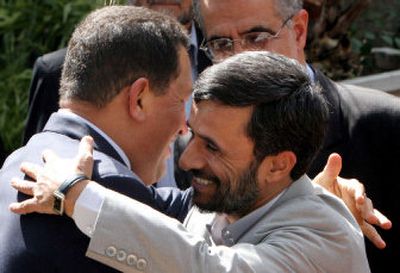 
Iranian President Mahmoud Ahmadinejad, right, welcomes Venezuela's President Hugo Chavez to Tehran on Saturday. Chavez is on his fifth visit to Iran, where he will talk with Ahmadinejad, a fellow critic of the United States.
 (Associated Press / The Spokesman-Review)