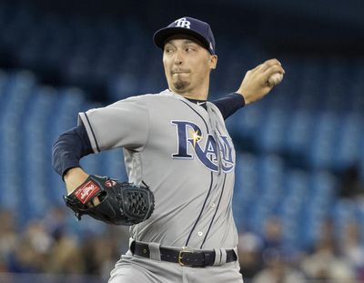 Tampa Bay Rays starting pitcher Blake Snell throws against the Toronto Blue Jays during the first inning of a baseball game in Toronto on Saturday, April 13, 2019. (Fred Thornhill / Canadian Press via AP)