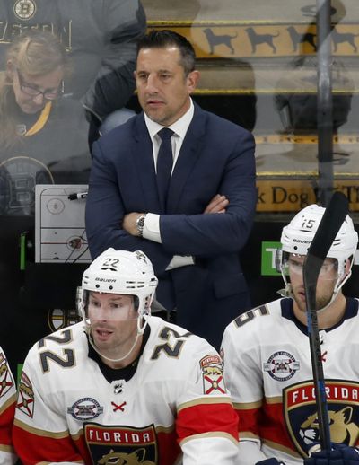 Florida Panthers head coach Bob Boughner looks out from the bench during the third period of an NHL hockey game against the Boston Bruins, Saturday, March 30, 2019, in Boston. (Mary Schwalm / AP)