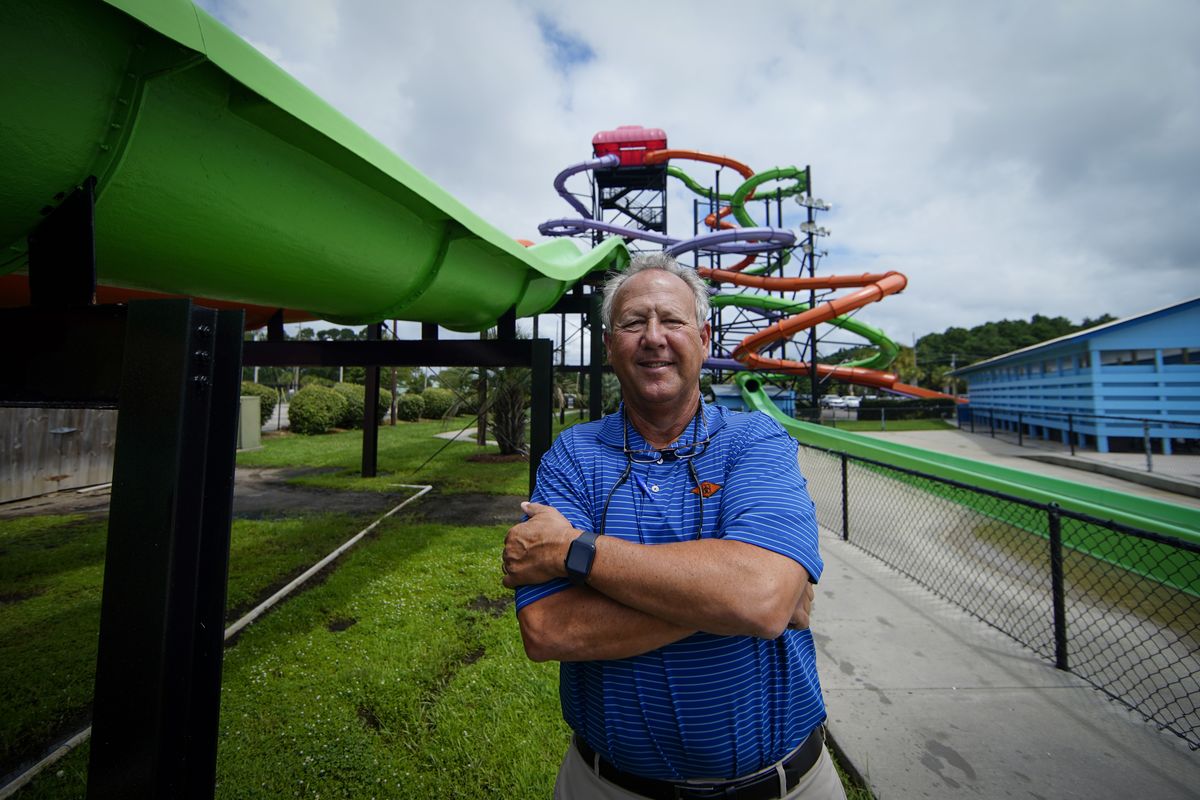 Mark Lazarus, the president and owner of Lazarus Entertainment Group, poses for a picture, Thursday, July 9, 2020, in Myrtle Beach, S.C. Businesses in beach communities and mountain getaways up and down the East Coast are fretting about a shortage of workers as the summer season picks up steam. The concern comes after the Trump administration announced in June that it was extending a ban on green cards and adding many temporary visas to the freeze, including J-1 cultural exchange visas and H-2B visas. (Chris Carlson)