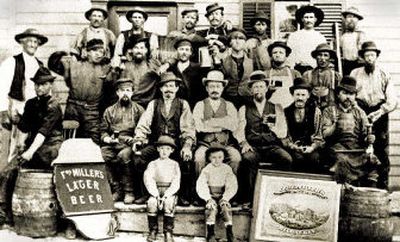 
In this 1875 photo provided by Miller Brewing Co., Miller founder Frederick J. Miller (front row, fourth from right) poses with employees.
 (Associated Press / The Spokesman-Review)