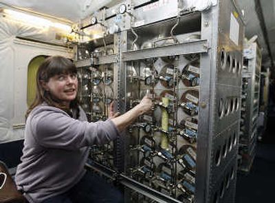 
Nicola Blake talks about the instrument aboard a DC-8 that captures particles in the atmosphere for analysis.
 (The Spokesman-Review)