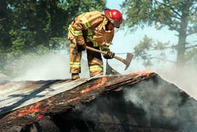 
Outbuildings are vulnerable because they are often used to store flammable materials.
 (File/ / The Spokesman-Review)
