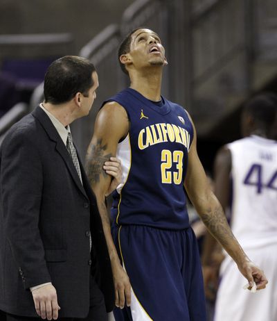 California's Allen Crabbe leaves the court after being injured against Washington on Thursday. (Associated Press)