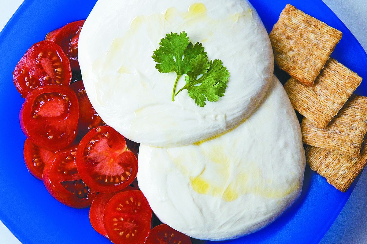 With a gallon of milk and a few basic kitchen tools, you can make mouth-watering mozzarella in less than an hour.  (Colin Mulvany)