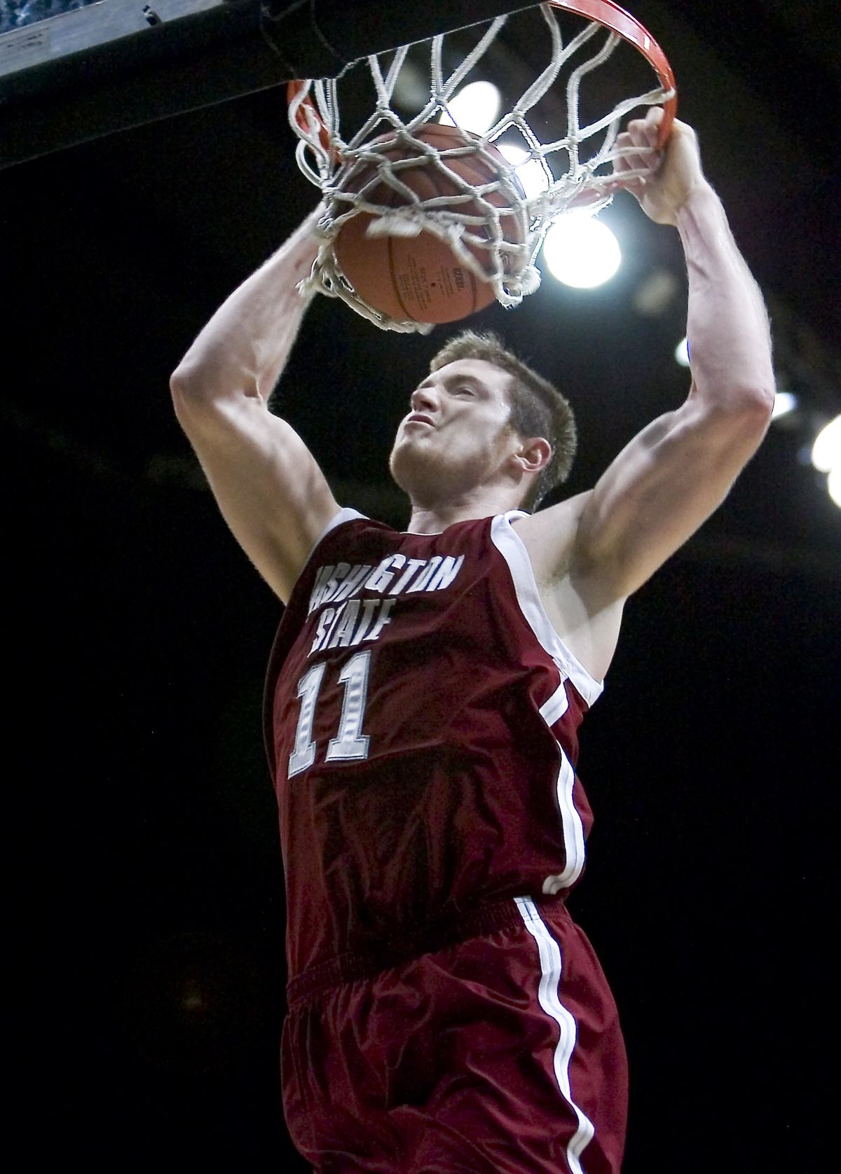 WSU’s Aron Baynes delivers two points late in second half. (Associated Press / The Spokesman-Review)