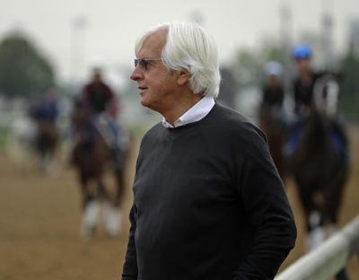 Trainer Bob Baffert, who has three Kentucky Derby hopefuls, watches on the track during a workout at Churchill Downs Tuesday, April 30, 2019, in Louisville, Ky. The 145th running of the Kentucky Derby is scheduled for Saturday, May 4. (Charlie Riedel / Associated Press)