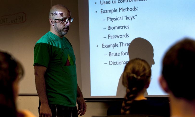 Kellogg School District Technology Coordinator Simon Miller talked about password security during a cyber security camp for kids at the Coeur d'Alene campus of University of Idaho on Wednesday. Story below. (Kathy Plonka)