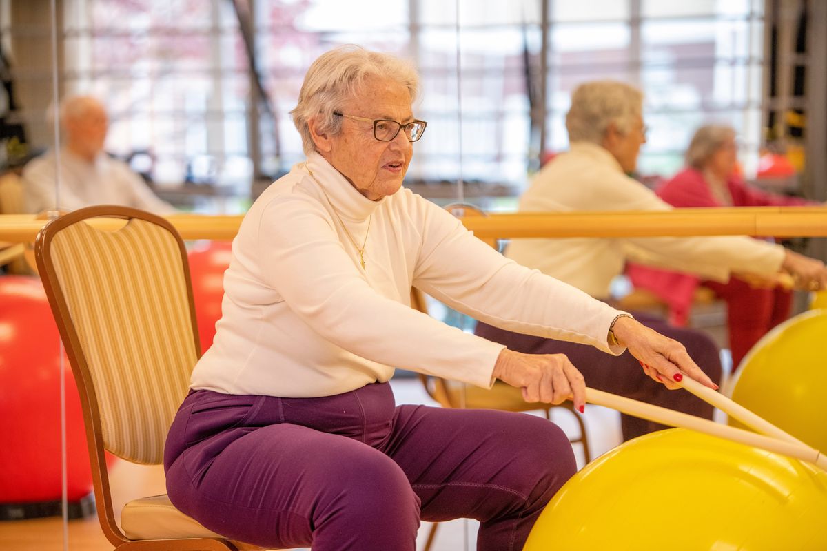 Seniors turn exercise into fun with drum sticks and stability balls