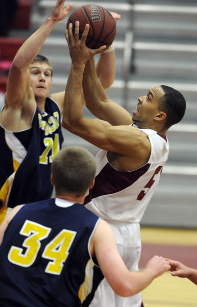 Whitworth's Idris Lasisi scores during a productive first half against UC Santa Cruz. (Colin Mulvany)