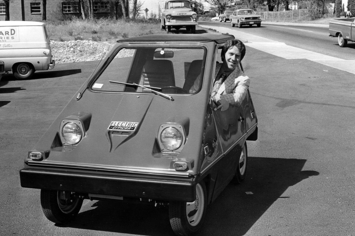 Spokesman-Review reporter Kent Swigard takes the electric CitiCar on a test drive in 1975 with Robert E. Bobbett, president of Standard Batteries Inc., which had just started selling CitiCars. In his story, Swigard suggested not to drive the vehicle up Freya Street and to take alternative routes instead to reach the South Hill.  (SPOKESMAN-REVIEW PHOTO ARCHIVES)