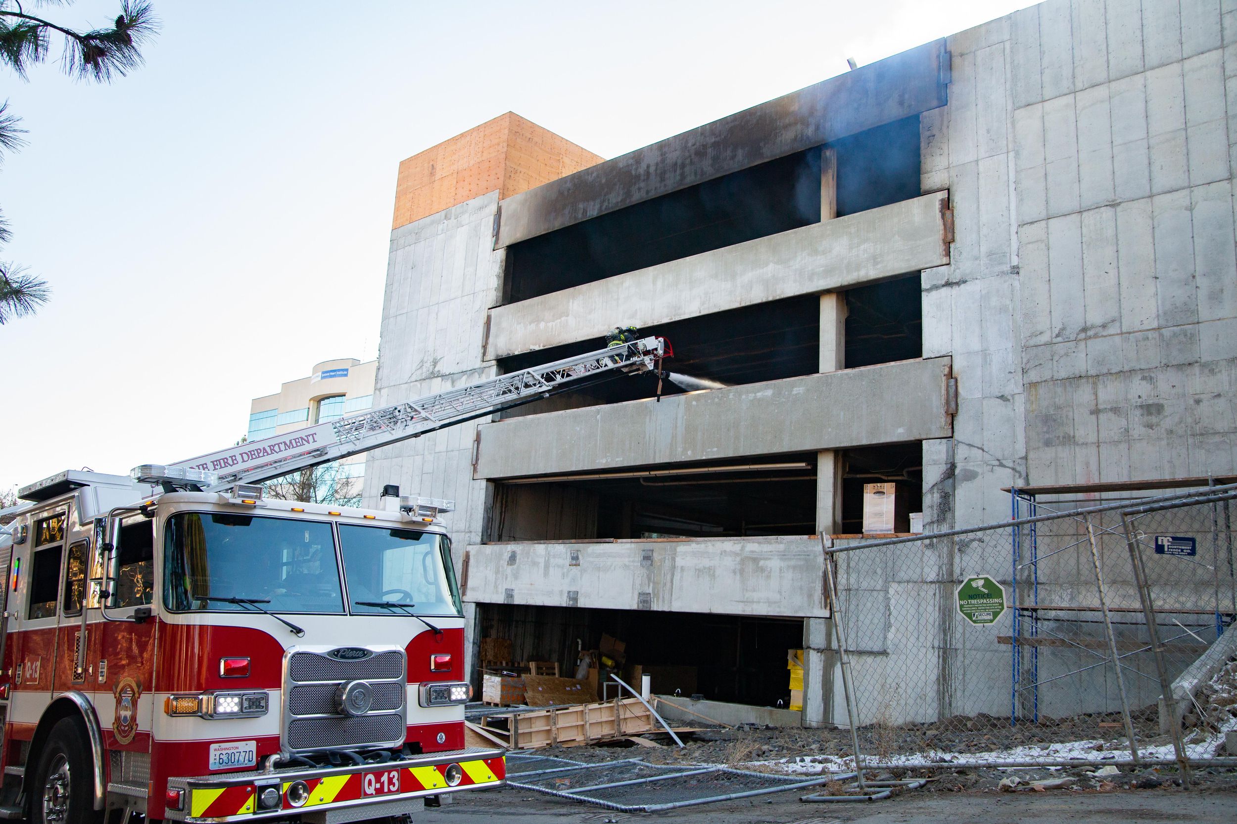 Fire officials can’t determine if arson caused hotel parking garage
