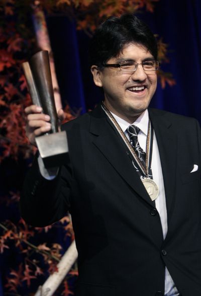 Sherman Alexie accepts the National Book Award for Young People’s Literature for his book “The Absolutely True Diary of a Part-Time Indian” at the 58th National Book Awards in New York in November 2007. (Associated Press)