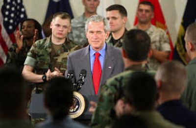 
President Bush winks at an airman after a speech at the Charleston Air Force Base  on Tuesday. Associated Press
 (Associated Press / The Spokesman-Review)