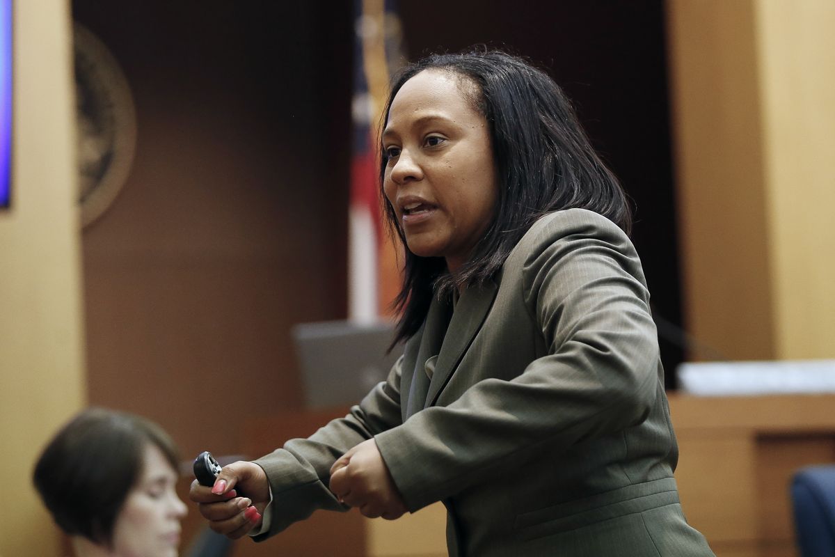 In this Wednesday, Aug. 24, 2016 photo, Fulton County Deputy District Attorney Fani Willis makes her closing arguments during a trial in Atlanta. Willis, entered the national spotlight Wednesday, Feb. 10, 2021, when letters to top state officials revealed her office is investigating whether illegal attempts were made to influence the state