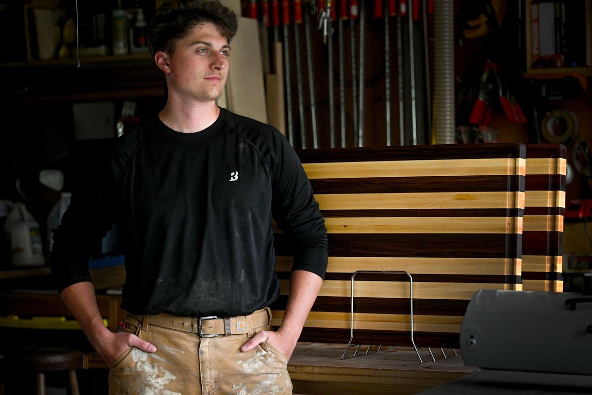 West Valley graduate Michael Liberg is photographed in his shop on May 21. He has started his own woodworking and handyman company called Liberg Design.  (Kathy Plonka/The Spokesman-Review)