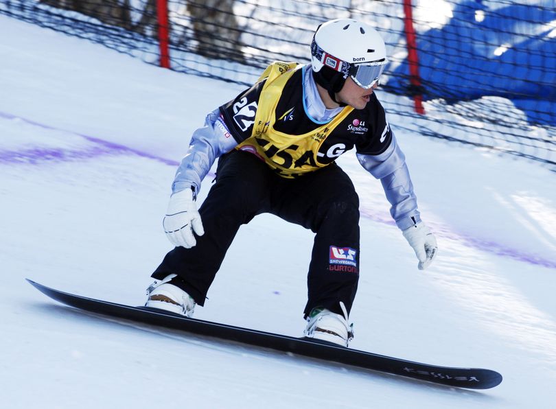 ORG XMIT: MERB104 Graham Watanabe, of Sun Valley, Idaho, races to victory in the men's snowboarding World Cup snowboardcross event, Saturday, Feb. 28, 2009, in Newry, Maine. (AP Photo/Robert F. Bukaty) (Robert Bukaty / The Spokesman-Review)