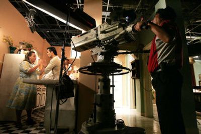 
Mexican actors Beatrice Moreno and Ernesto D'Alessio perform on the set of the telenovela 