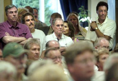 
Hundreds packed into a meeting room at the Coeur d'Alene Inn for public hearing of the Idaho legislature's interim property tax committee Wednesday. 
 (Holly Pickett / The Spokesman-Review)