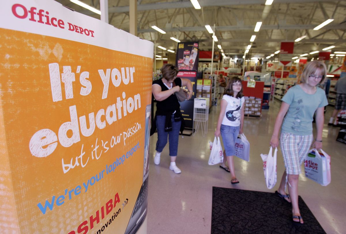 Students and shoppers walk out of Office Depot after purchasing school supplies in Mountain View, Calif., on Tuesday.Associated Press photos (Associated Press photos / The Spokesman-Review)