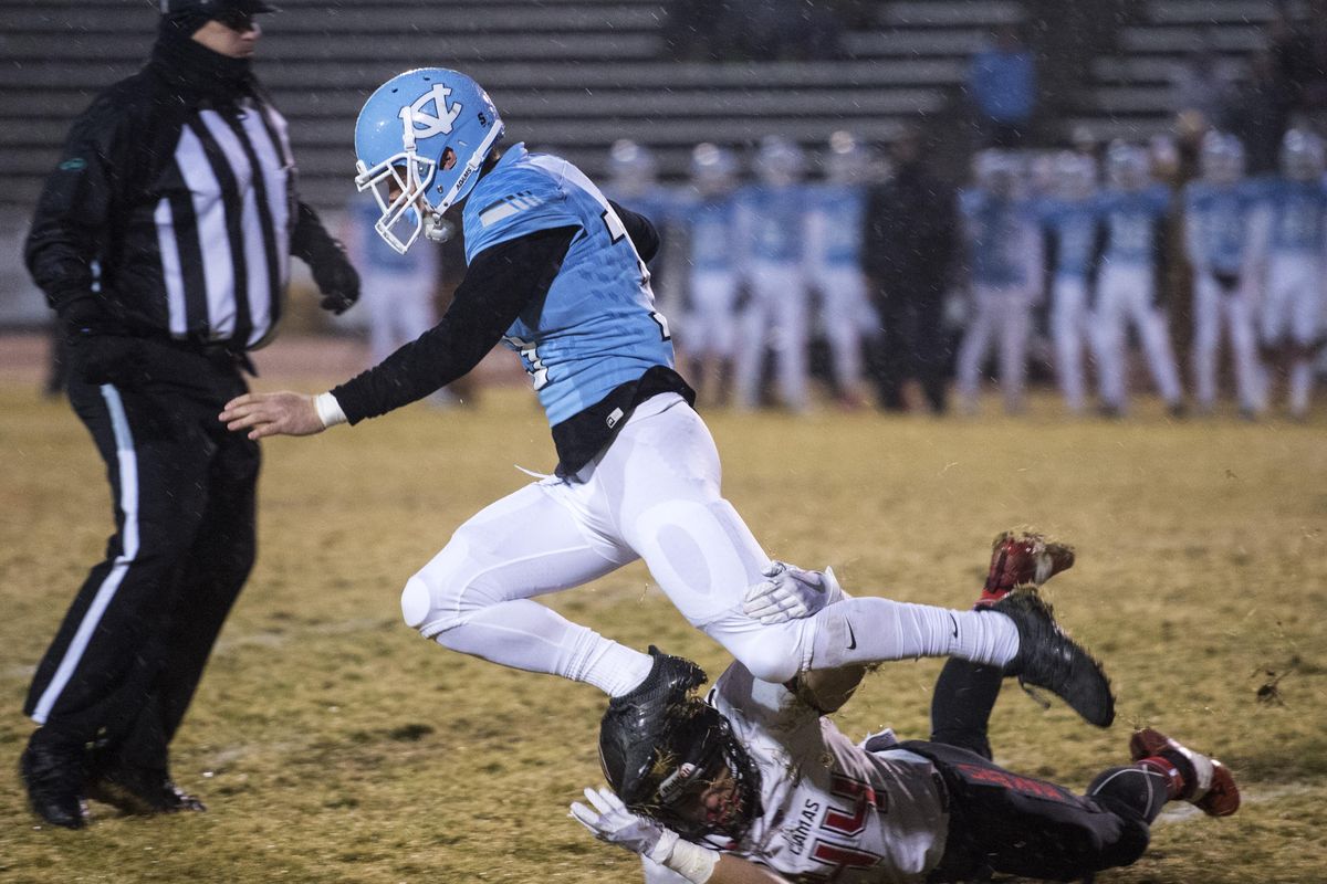Central Valley RB Hunter Chodorowski plows over Camas’ Kyle Allen, Friday, Nov. 10. 2017, during their 4A playoff game at CV. (Dan Pelle / The Spokesman-Review)