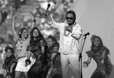 
Hawaiian entertainer Don Ho sings during the Pro Bowl halftime show at Aloha Stadium in Honolulu in February 2005. 
 (Associated Press / The Spokesman-Review)