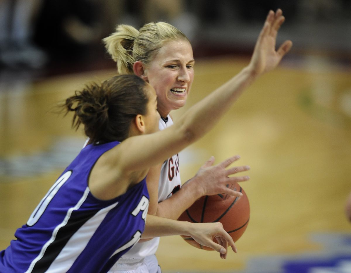 Courtney Vandersloot looks for an opening in the Portland defense to try and drive the lane during first half action in their semifinal game of the WCC Tournament in Las Vegas on Sunday, March 6, 2011.  The Zags won the game to advance to the Monday final. (Christopher Anderson / The Spokesman-Review)