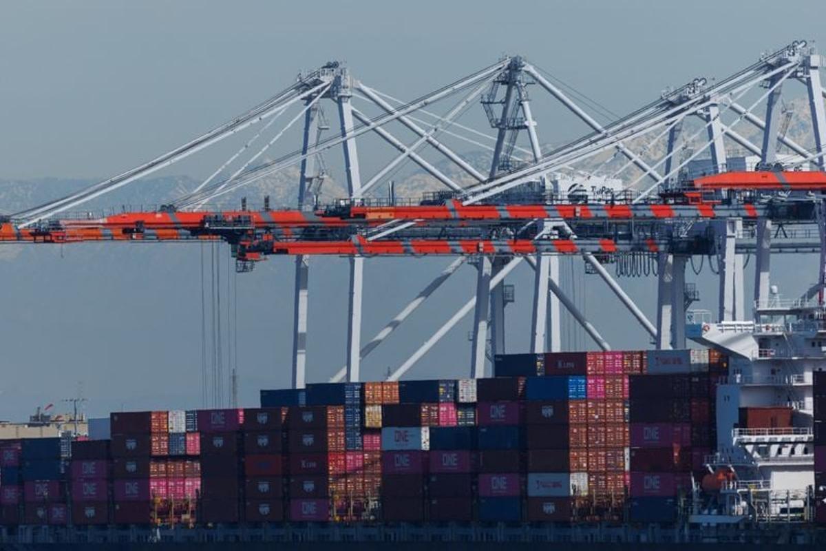 Shipping containers are shown stacked at the West Basin Container Terminal on Feb. 24 at the Port of Los Angeles.  (Mike Blake/Reuters)