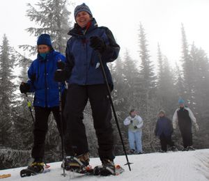 A group heads out on a guided snowshoeing trek, one of several activities offered during the Women’s Souper Bowl at Mount Spokane.  (File)