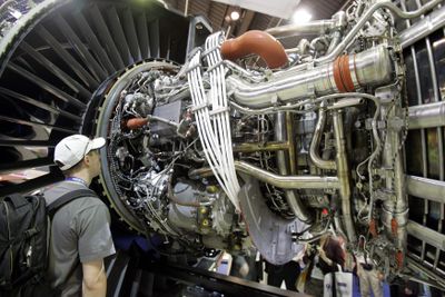 A visitor views a General Electric NX jet engine that will provide power for Boeing’s new 787 Dreamliner, at Le Bourget airport during the  Paris Air Show on Wednesday. Boeing said the 787 is nearly ready for its maiden flight.  (Associated Press / The Spokesman-Review)